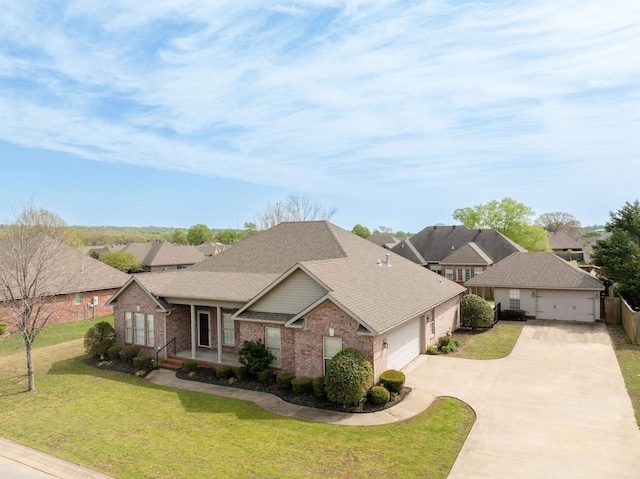 408 Crain Dr, Searcy, AR 72143 - single story home with driveway, an attached garage, a front lawn, brick siding, and a shingled roof