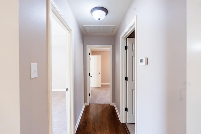 408 Crain Dr, Searcy, AR 72143 - corridor with dark wood-type flooring, baseboards, and visible vents