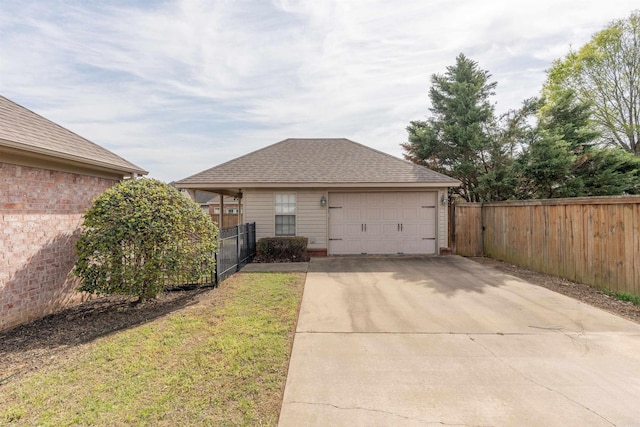 408 Crain Dr, Searcy, AR 72143 - rear view of property with a garage, a yard, a shingled roof, fence, and driveway