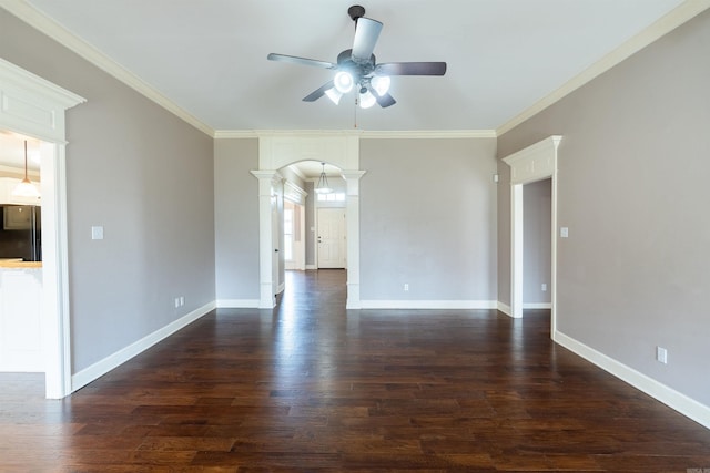 408 Crain Dr, Searcy, AR 72143 - empty room featuring arched walkways, a ceiling fan, crown molding, ornate columns, and dark wood-type flooring