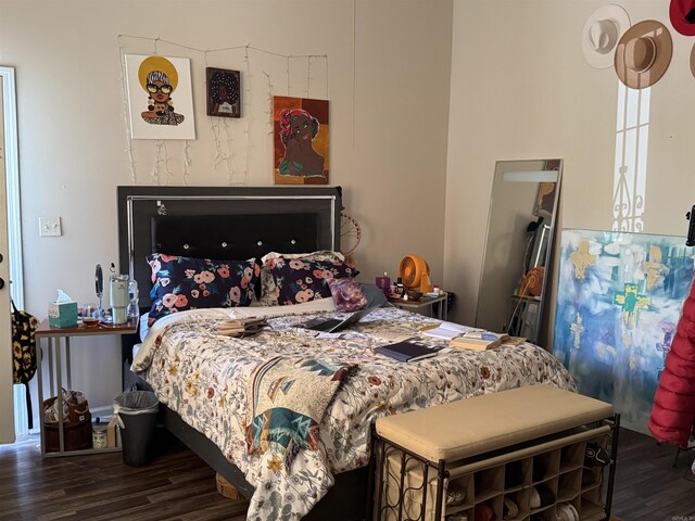 bedroom featuring wood finished floors