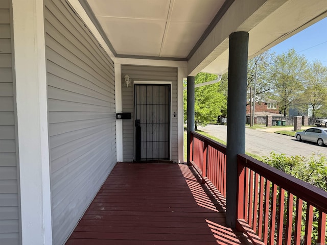 wooden terrace with covered porch