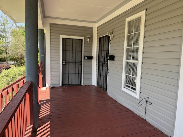 wooden deck featuring a porch
