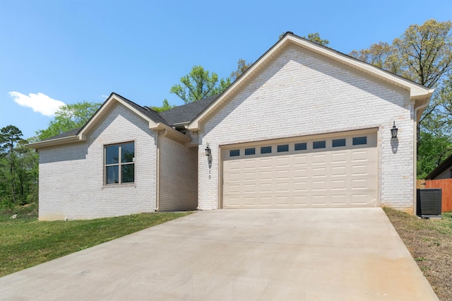 8010 Kanis Oaks Dr, Little Rock, AR 72204 - single story home with brick siding, central AC unit, a garage, and concrete driveway