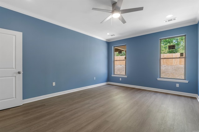 8010 Kanis Oaks Dr, Little Rock, AR 72204 - spare room with a ceiling fan, dark wood-type flooring, ornamental molding, and visible vents