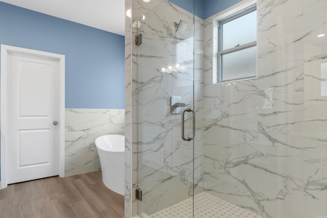 8010 Kanis Oaks Dr, Little Rock, AR 72204 - full bathroom featuring a freestanding bath, wainscoting, tile walls, and a stall shower