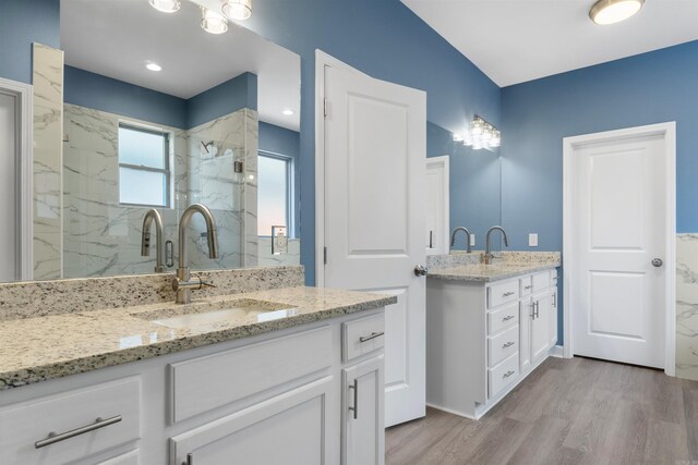 8010 Kanis Oaks Dr, Little Rock, AR 72204 - full bath with a sink, two vanities, a marble finish shower, and wood finished floors