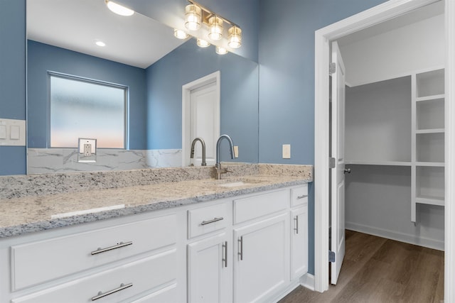 8010 Kanis Oaks Dr, Little Rock, AR 72204 - bathroom featuring wood finished floors and vanity