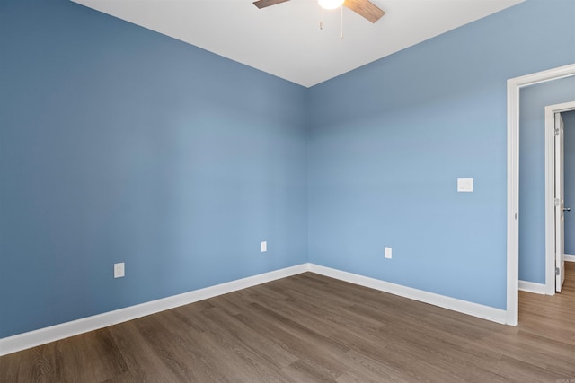 8010 Kanis Oaks Dr, Little Rock, AR 72204 - unfurnished room with ceiling fan, baseboards, and dark wood finished floors