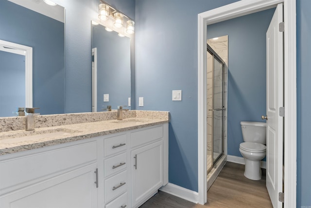 8010 Kanis Oaks Dr, Little Rock, AR 72204 - full bathroom with toilet, wood finished floors, a sink, and a shower stall
