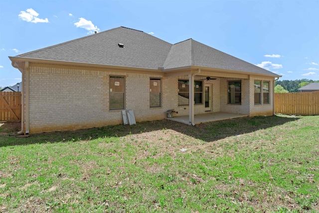 8010 Kanis Oaks Dr, Little Rock, AR 72204 - rear view of house featuring a patio area, brick siding, and fence