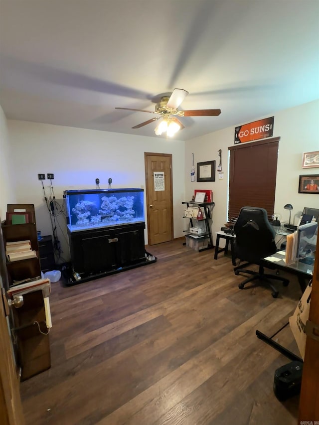 home office featuring a ceiling fan and wood finished floors