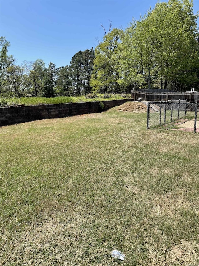 view of yard featuring fence