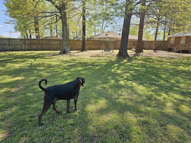 view of yard featuring a fenced backyard