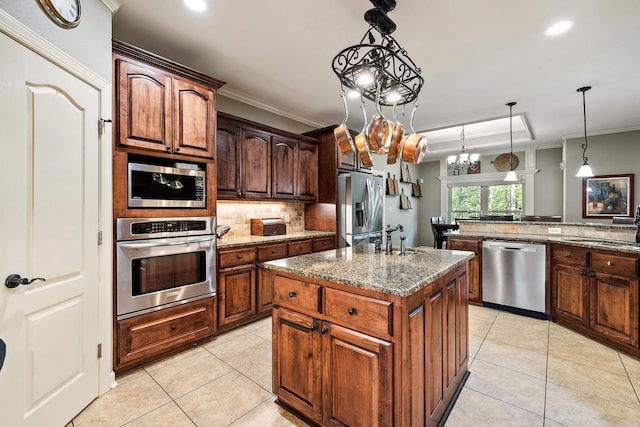 kitchen with a sink, a center island with sink, backsplash, light tile patterned flooring, and stainless steel appliances