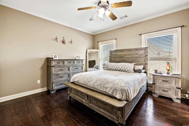 bedroom featuring visible vents, baseboards, ornamental molding, ceiling fan, and hardwood / wood-style flooring