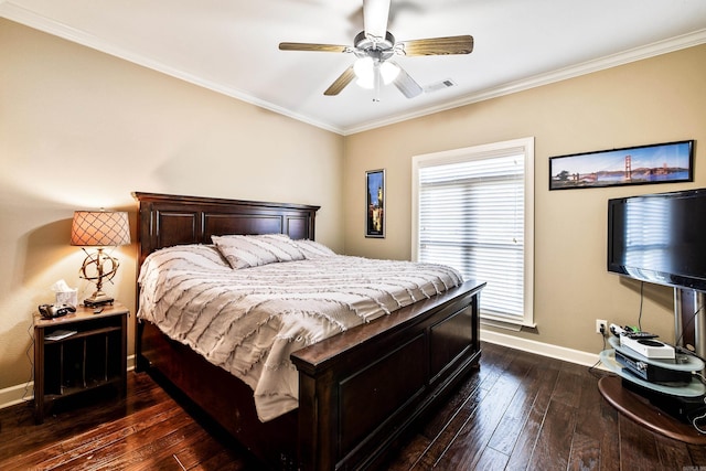 bedroom featuring visible vents, baseboards, ornamental molding, ceiling fan, and dark wood finished floors