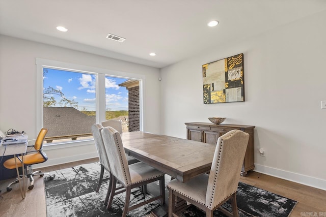 dining space featuring recessed lighting, visible vents, baseboards, and wood finished floors