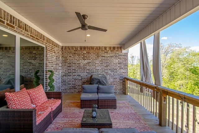 exterior space featuring ceiling fan and an outdoor hangout area