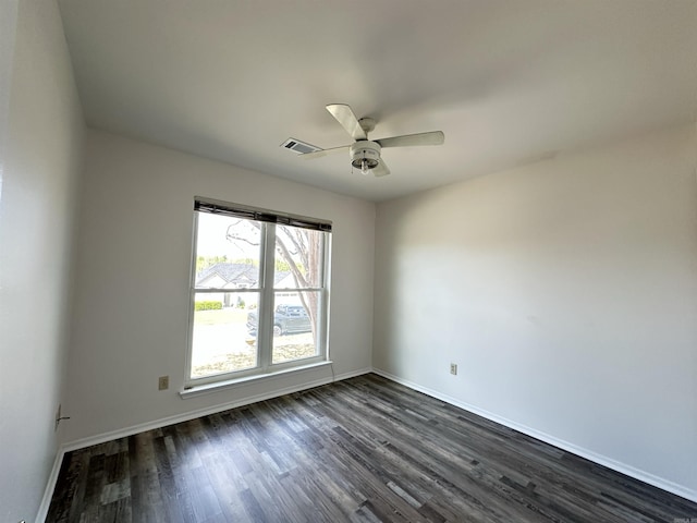 3 Park Ridge Dr, Maumelle, AR 72113 - spare room with dark wood-type flooring, baseboards, and a ceiling fan