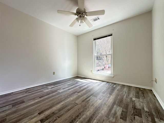 3 Park Ridge Dr, Maumelle, AR 72113 - empty room featuring dark wood-type flooring, baseboards, and ceiling fan