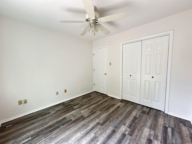 3 Park Ridge Dr, Maumelle, AR 72113 - unfurnished bedroom featuring dark wood-style floors, baseboards, a closet, and a ceiling fan