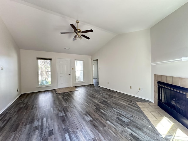 3 Park Ridge Dr, Maumelle, AR 72113 - unfurnished living room featuring vaulted ceiling, baseboards, and wood finished floors