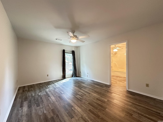 3 Park Ridge Dr, Maumelle, AR 72113 - unfurnished room featuring dark wood finished floors, a ceiling fan, and baseboards