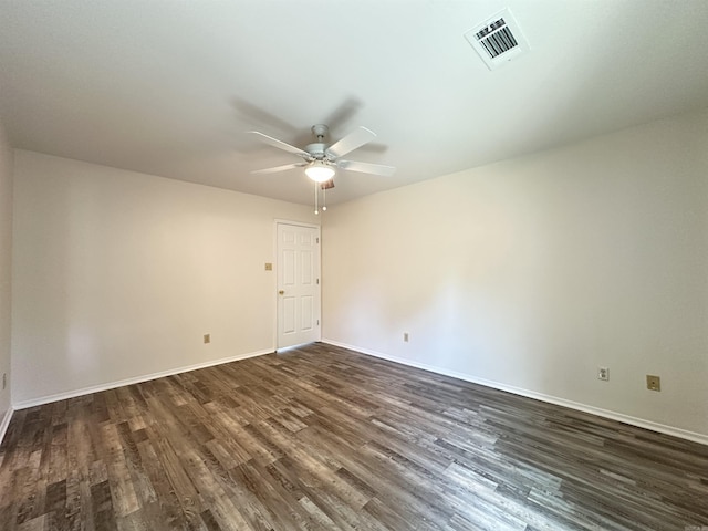 3 Park Ridge Dr, Maumelle, AR 72113 - spare room with dark wood-type flooring, a ceiling fan, and baseboards