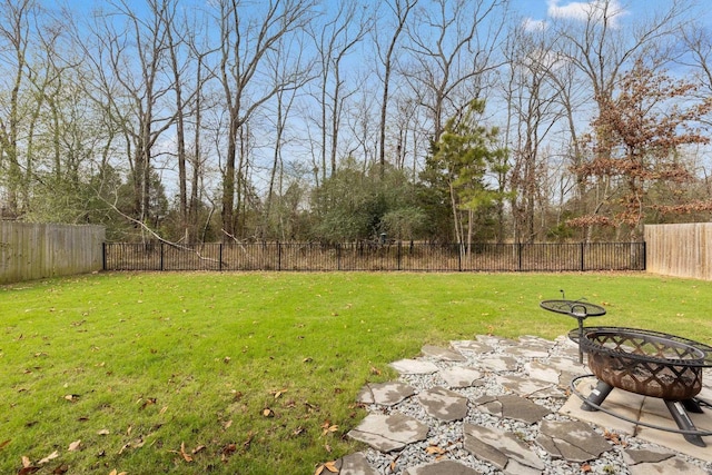 view of yard with a fenced backyard