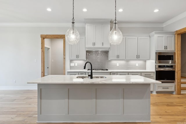 kitchen featuring recessed lighting, crown molding, backsplash, appliances with stainless steel finishes, and pendant lighting
