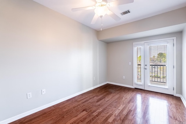 820 N St, Little Rock, AR 72201 - spare room with wood finished floors, ceiling fan, baseboards, and visible vents