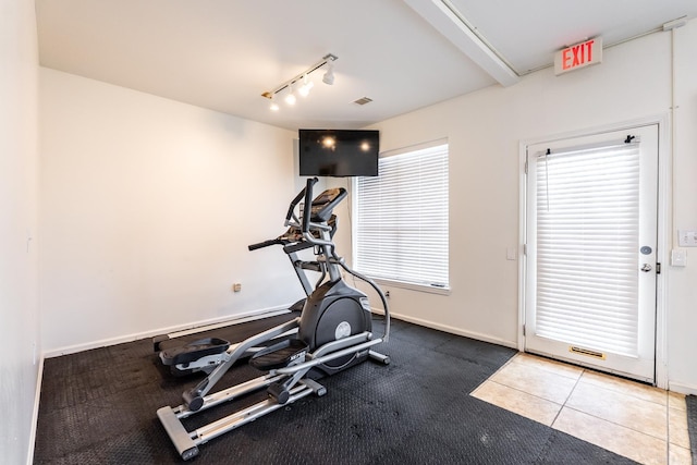 820 N St, Little Rock, AR 72201 - workout area featuring tile patterned flooring, visible vents, baseboards, and track lighting