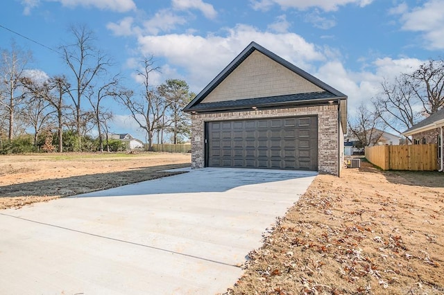 exterior space with fence and brick siding