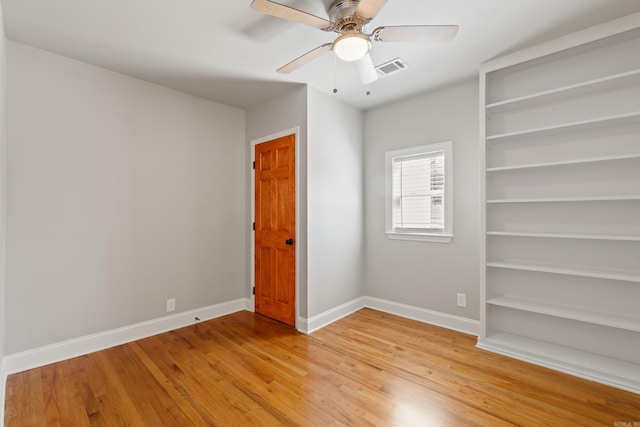 6723 Greenwood, Little Rock, AR 72207 - unfurnished bedroom featuring baseboards, ceiling fan, light wood-type flooring, and visible vents