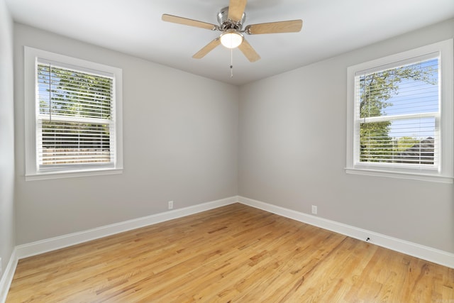 6723 Greenwood, Little Rock, AR 72207 - empty room featuring a ceiling fan, baseboards, a healthy amount of sunlight, and light wood-type flooring