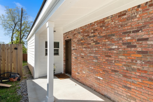 6723 Greenwood, Little Rock, AR 72207 - doorway to property with brick siding and fence