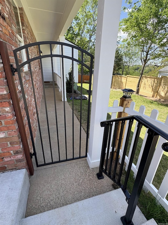 6723 Greenwood, Little Rock, AR 72207 - view of gate with fence and a lawn