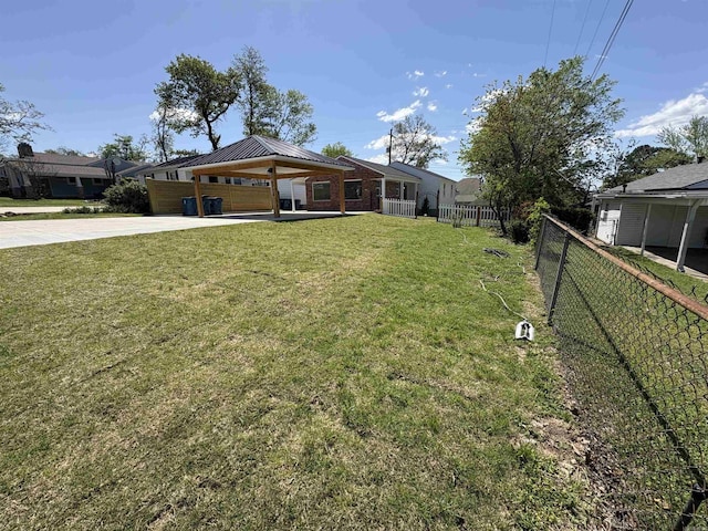 6723 Greenwood, Little Rock, AR 72207 - view of front of property with fence, a gazebo, driveway, and a front lawn