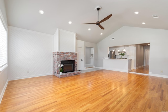 6723 Greenwood, Little Rock, AR 72207 - unfurnished living room with a ceiling fan, high vaulted ceiling, visible vents, and light wood-style flooring