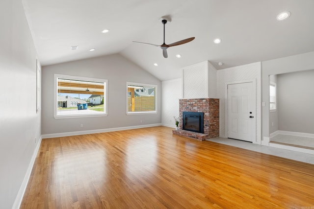6723 Greenwood, Little Rock, AR 72207 - unfurnished living room with baseboards, plenty of natural light, a fireplace, and a ceiling fan