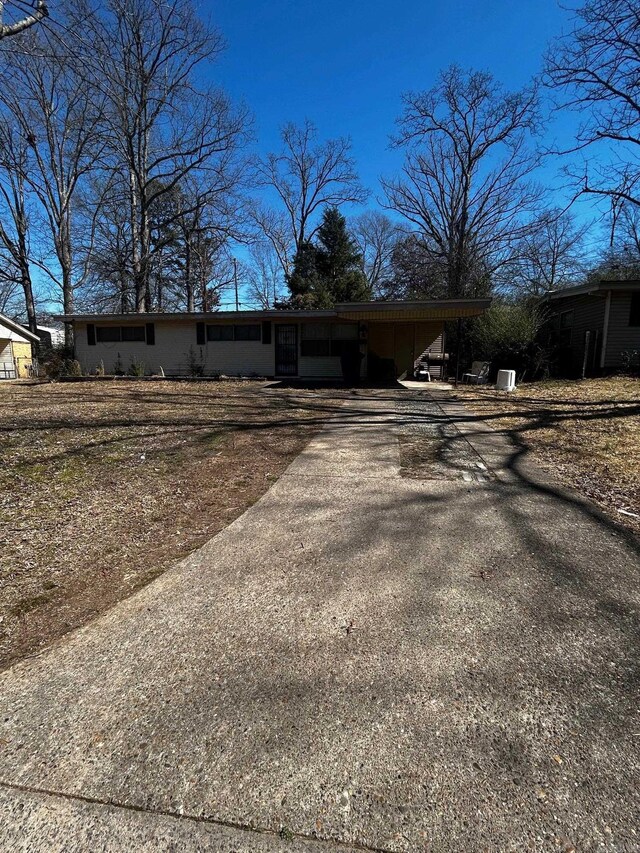 11711 Springtree, Little Rock, AR 72209 - view of front of home featuring a carport and driveway