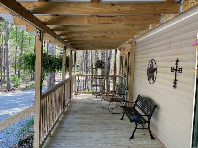 wooden deck featuring a porch