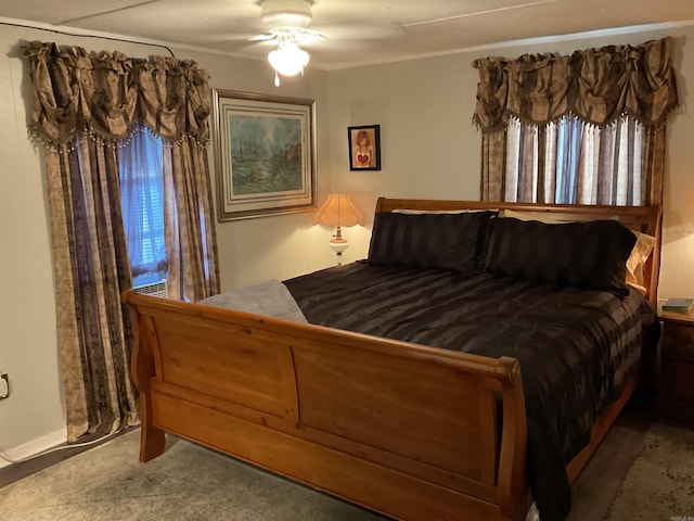 bedroom with carpet flooring and a ceiling fan