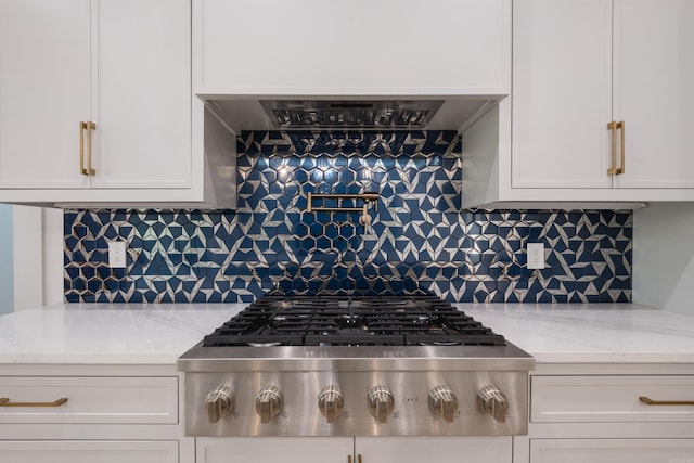 221 Abington Cir, Little Rock, AR 72223 - kitchen with tasteful backsplash, white cabinets, stainless steel gas cooktop, and extractor fan