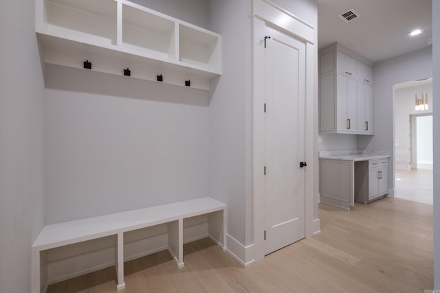 221 Abington Cir, Little Rock, AR 72223 - mudroom featuring visible vents, baseboards, recessed lighting, and light wood-style floors