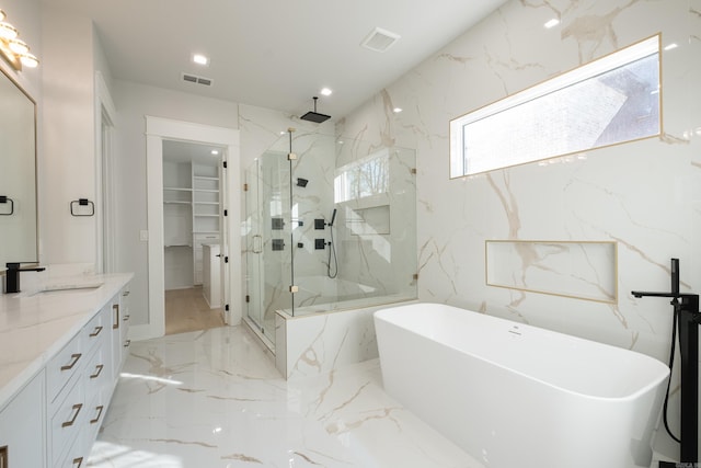 221 Abington Cir, Little Rock, AR 72223 - bathroom featuring a freestanding bath, visible vents, marble finish floor, and a marble finish shower