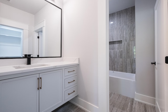 221 Abington Cir, Little Rock, AR 72223 - bathroom with visible vents, baseboards, vanity, and wood finished floors