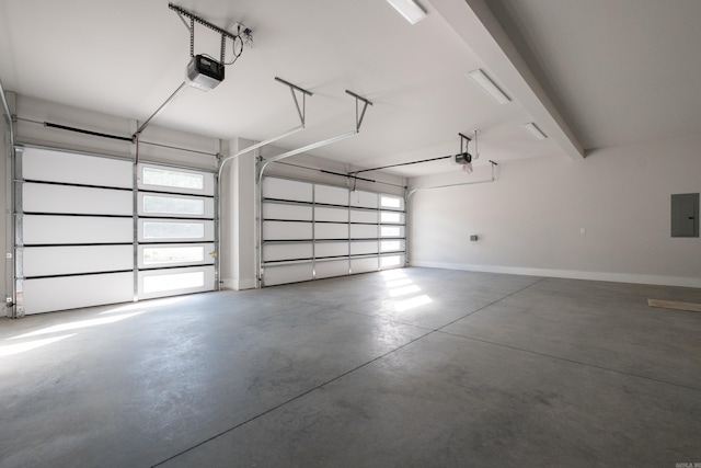 221 Abington Cir, Little Rock, AR 72223 - garage with a garage door opener, baseboards, and electric panel