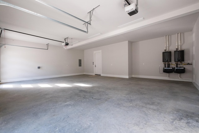 221 Abington Cir, Little Rock, AR 72223 - garage featuring a garage door opener and electric panel
